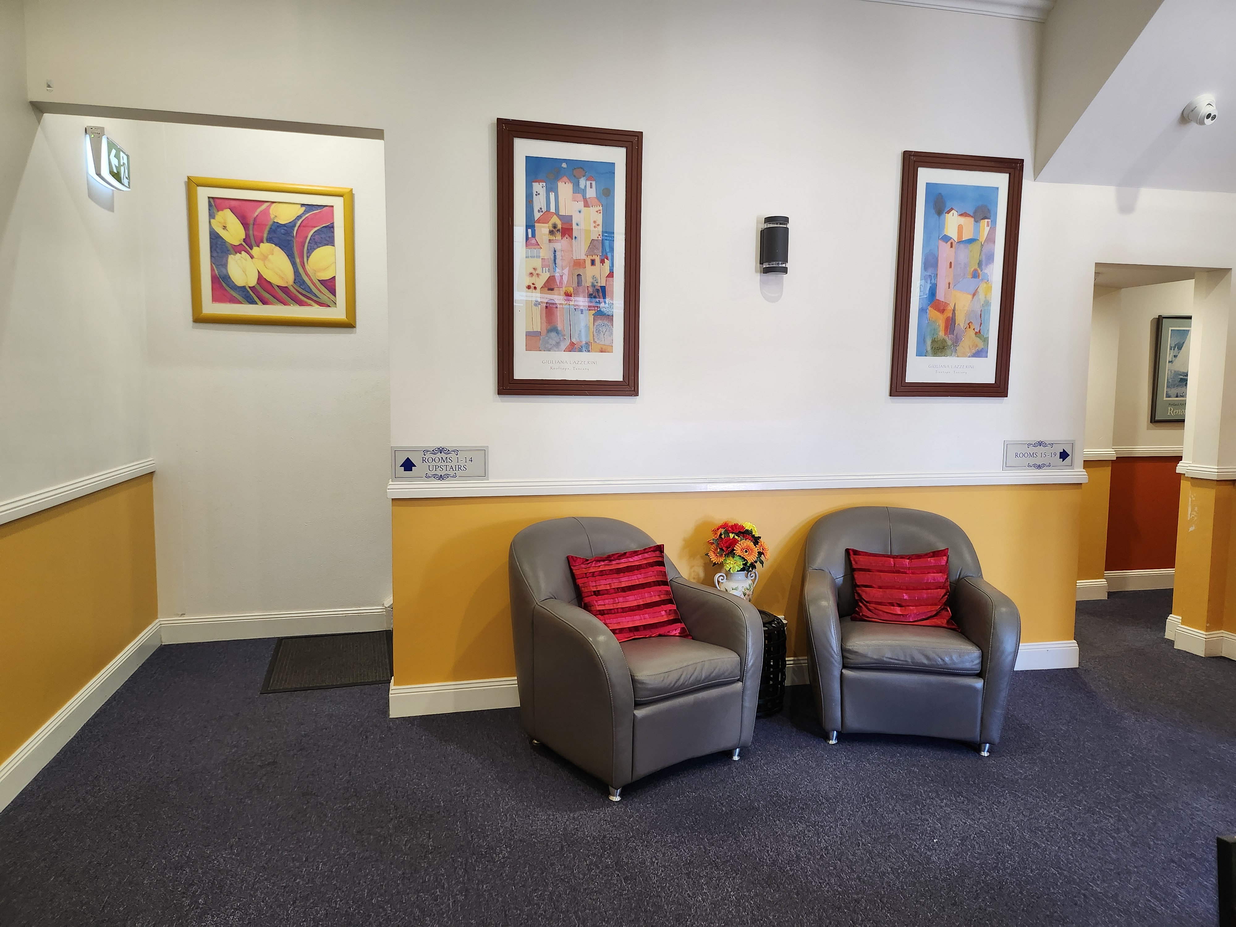 The Royal Hotel Gympie reception seating area with comfortable armchairs